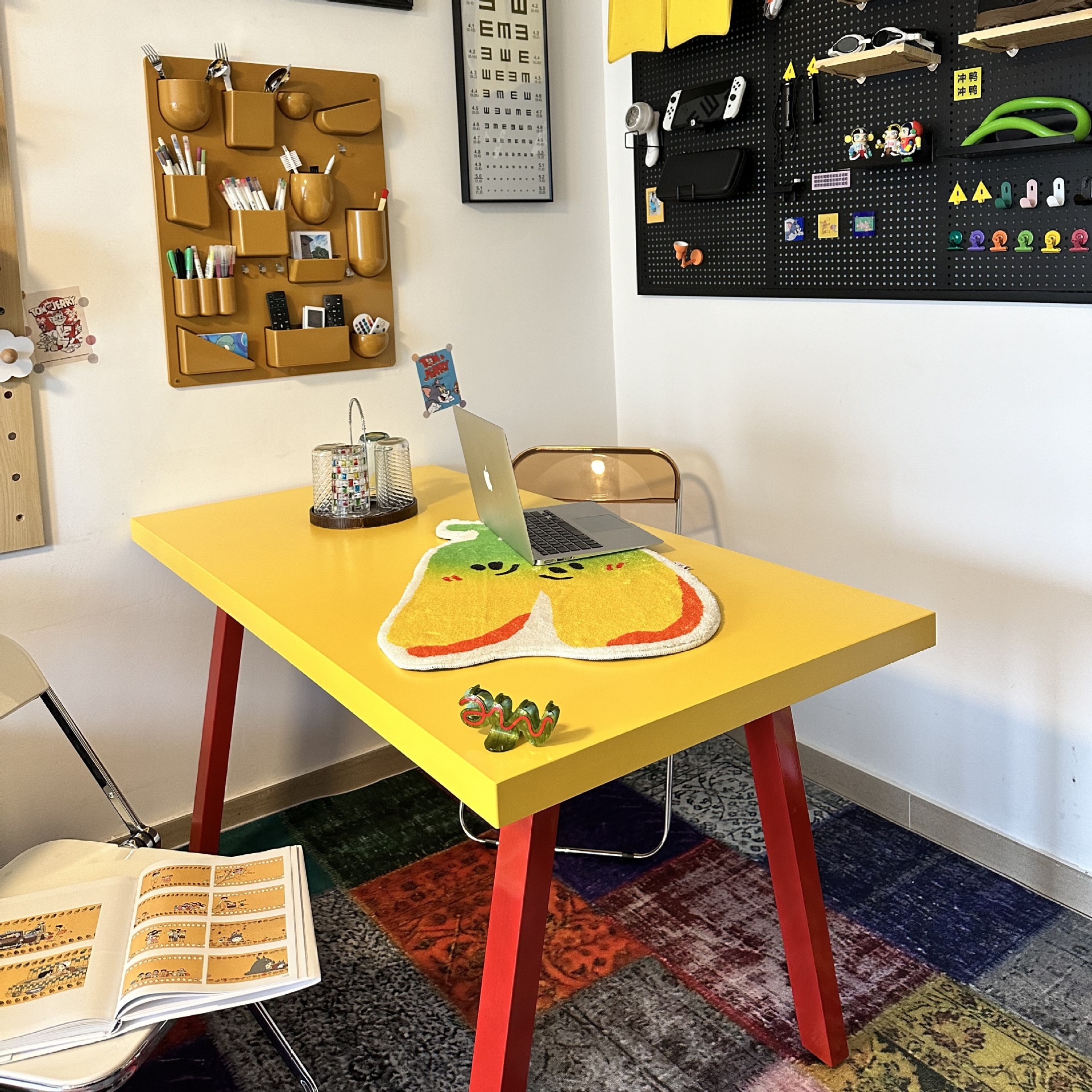Yellow table with red legs